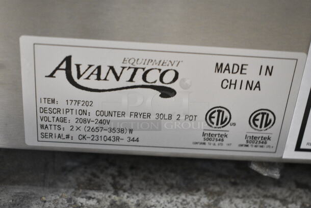 BRAND NEW SCRATCH AND DENT! 2023 Avantco 177F202 Stainless Steel Commercial Countertop Electric Powered 2 Bay Fryer w/ Lids and Metal Fry Baskets. 208-240 Volts, 1 Phase. Tested and Working!  - Image 7 of 7