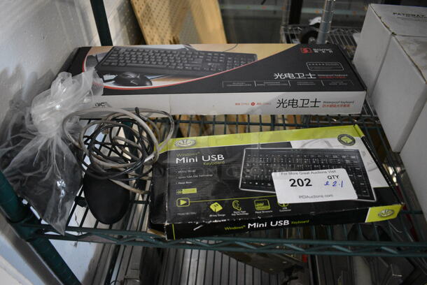 ALL ONE MONEY! Lot of 2 Keyboards and Mouse! - Image 1 of 4