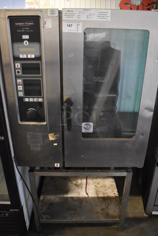 Henny Penny LCB-10 Stainless Steel Commercial Natural Gas Powered Combi Convection Oven on Equipment Stand. 35x31x71
