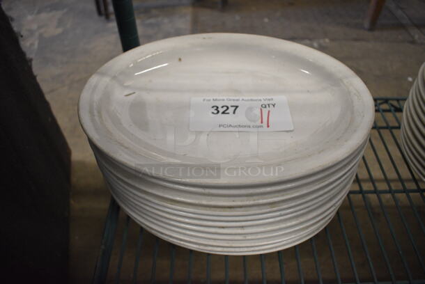 11 White Ceramic Oval Plates. 11.5x9x1. 11 Times Your Bid! - Image 1 of 3