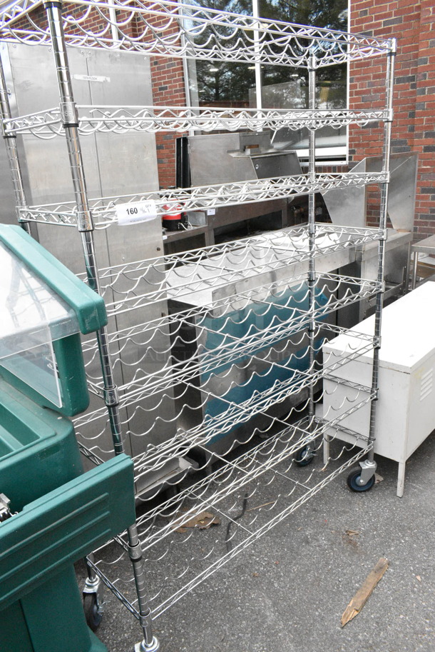 Chrome Finish 8 Tier Wine Bottle Rack on Commercial Casters. BUYER MUST DISMANTLE. PCI CANNOT DISMANTLE FOR SHIPPING. PLEASE CONSIDER FREIGHT CHARGES. - Image 1 of 3