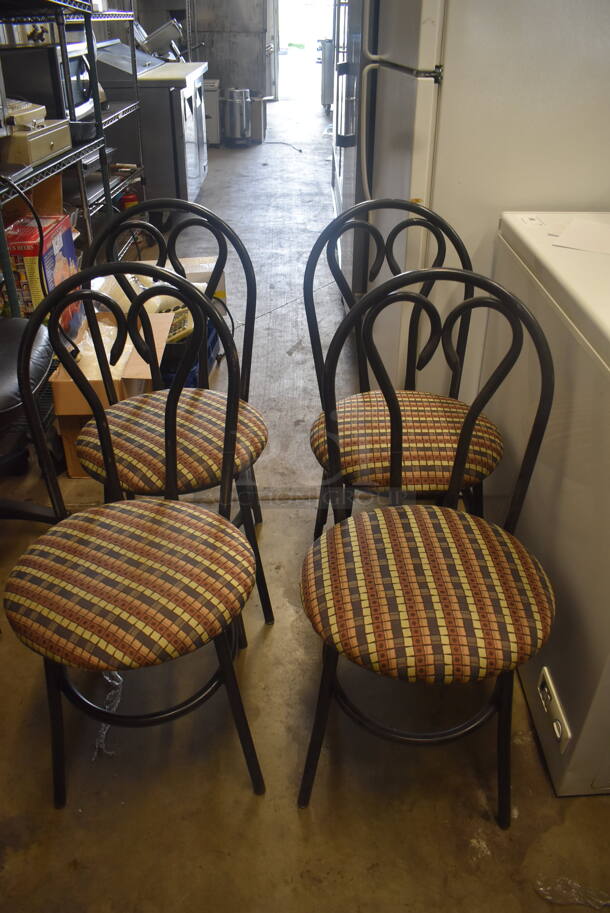 4 Black Bistro Dining Chairs with Circular Cushions. Some Pads May Need Reattached. Stock Picture - Cosmetic Condition May Vary. 4 Times Your Bid!