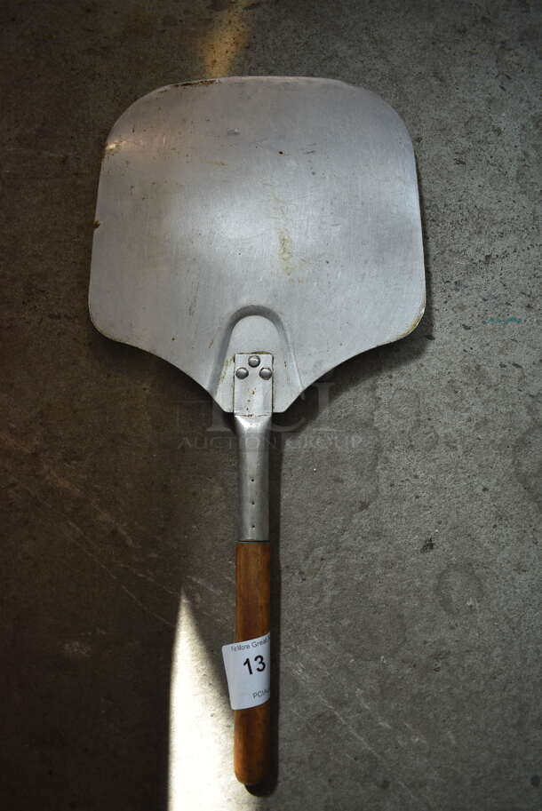 Metal Pizza Peel w/ Wooden Handle. 26x12x1