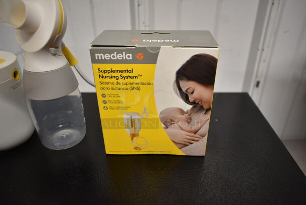 LIKE NEW! 2023 Medela Pump in Style Double Breast Pump w/ 2 Bottles, Accessories - Image 4 of 7