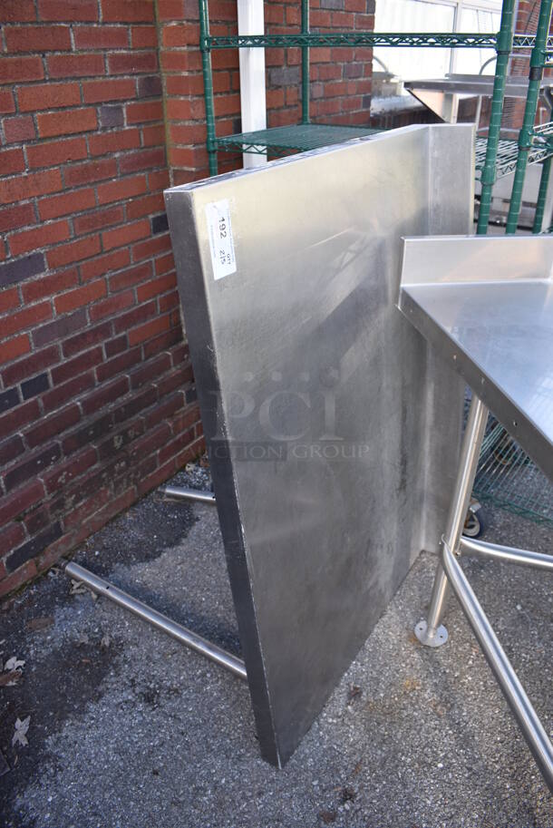 Stainless Steel Table w/ Back Splash. Missing 2 Legs. 48x34x40 - Image 1 of 4