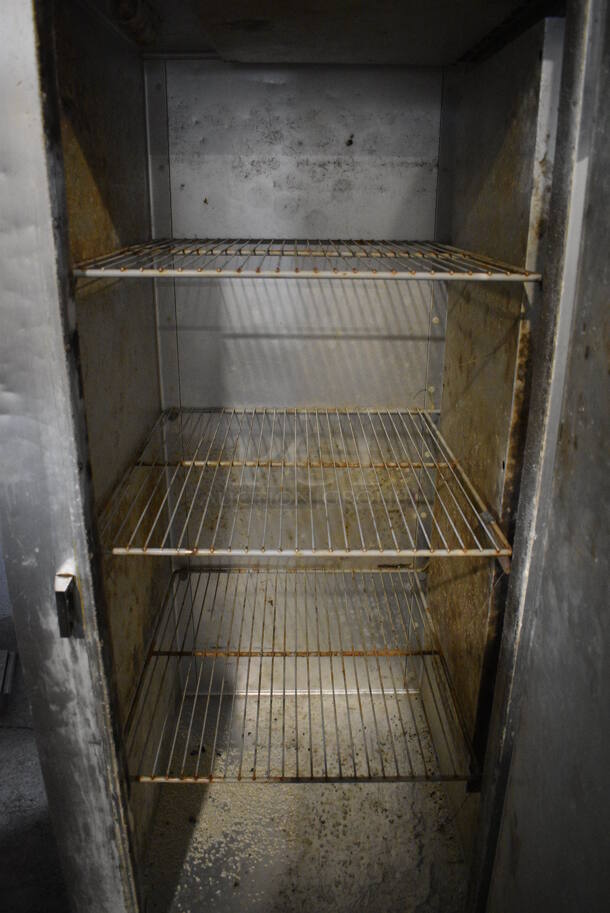 Traulsen Model G12010 Stainless Steel Commercial Single Door Reach In Freezer w/ Poly Coated Racks on Commercial Casters. 115 Volts, 1 Phase. 30x34x83. Tested and Powers On But Temps at 56 Degrees - Image 5 of 6