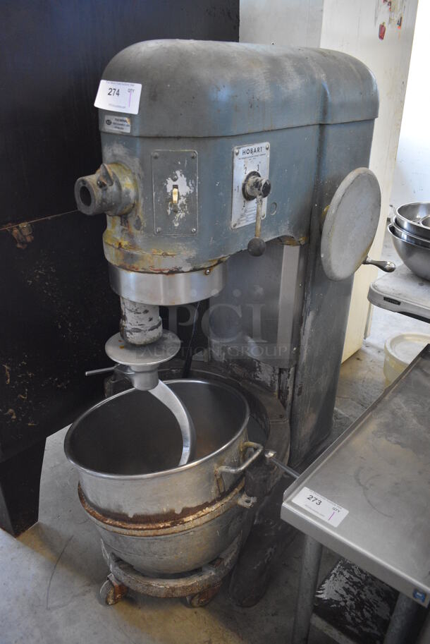 Hobart Model H-600 Metal Commercial Floor Style 60 Quart Planetary Dough Mixer w/ Metal Mixing Bowl, Bowl Dolly and Dough Hook Attachment. 230 Volts, 1 Phase. 26x42x56