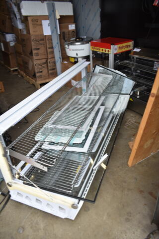 BRAND NEW SCRATCH AND DENT! Avantco 360BCS60HCW 60" White Refrigerated Square Countertop Bakery Display Case with LED Lighting. See Pictures for Damage. Tested and Powers On But Does Not Get Cold