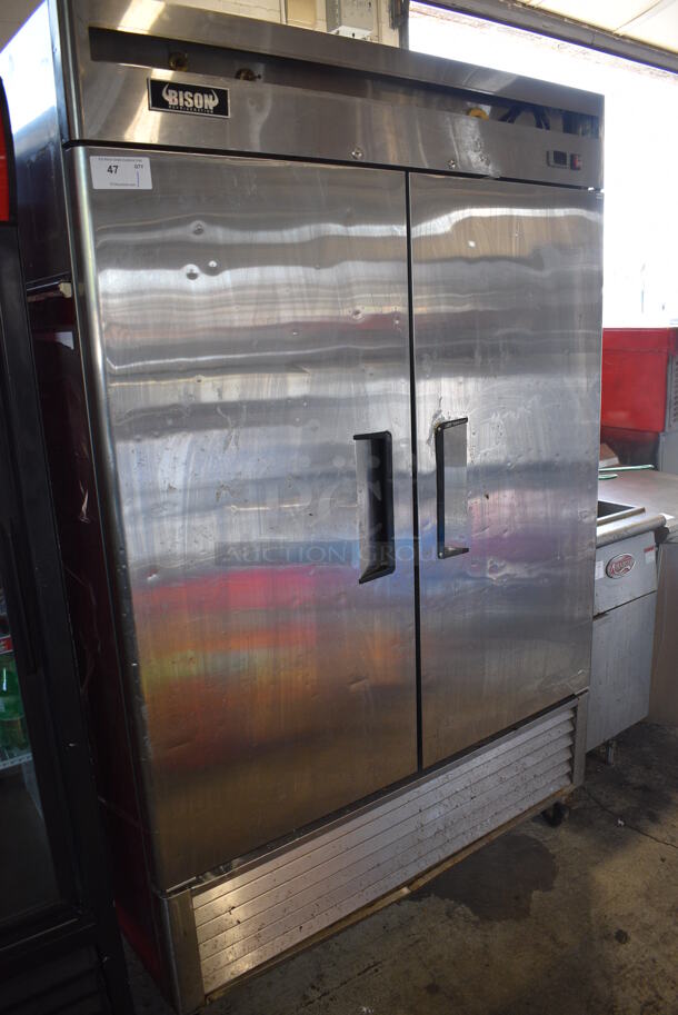Bison Model MBF8507 Stainless Steel Commercial 2 Door Reach In Cooler w/ Poly Coated Racks on Commercial Casters. 115 Volts, 1 Phase. 54x32x83.5. Tested and Working! - Image 2 of 6