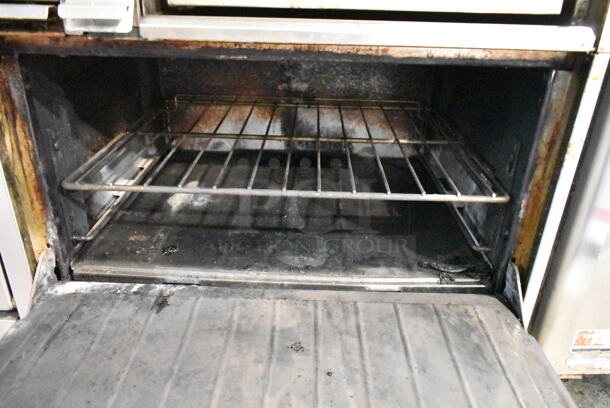 Garland X60-6R24RR Stainless Steel Commercial Propane Gas Powered 6 Burner Range w/ Right Side Flat Top Griddle and 2 Ovens. - Image 7 of 11