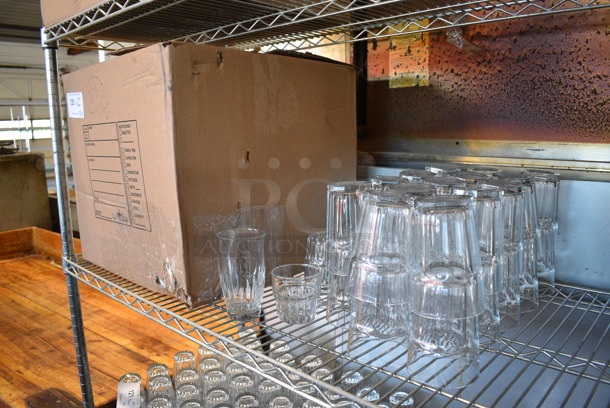 ALL ONE MONEY! Tier Lot of Approximately 108 Beverage Glasses, 9 Rocks Glasses and 28 Glasses. Includes 3.5x3.5x5
