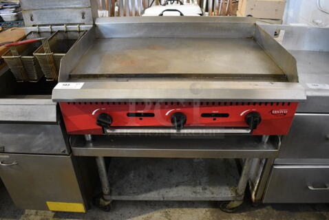 2021 Avantco CAG36MG Stainless Steel Commercial Countertop Natural Gas Powered Flat Top Griddle w/ Stainless Steel Commercial Equipment Stand on Commercial Casters. 36x30x18, 36x30x26