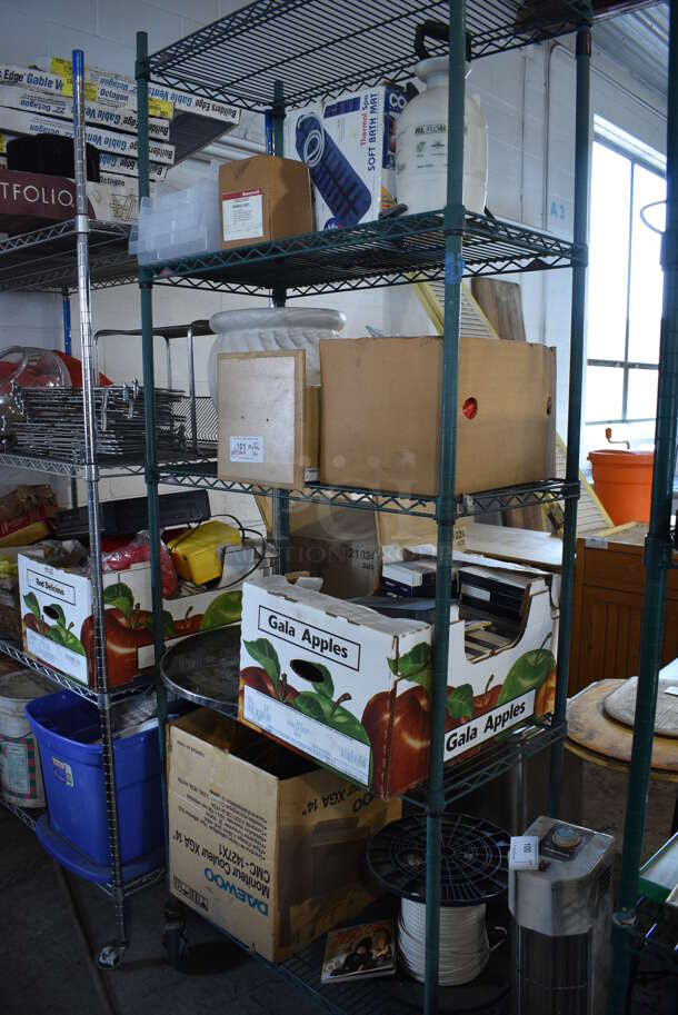 ALL ONE MONEY! Lot of 4 Tiers Worth of Various Items Including VHS Tapes, Bath Mat, Hymn Books and Small Collapsible Table. Does Not Come w/ The Shelving Unit