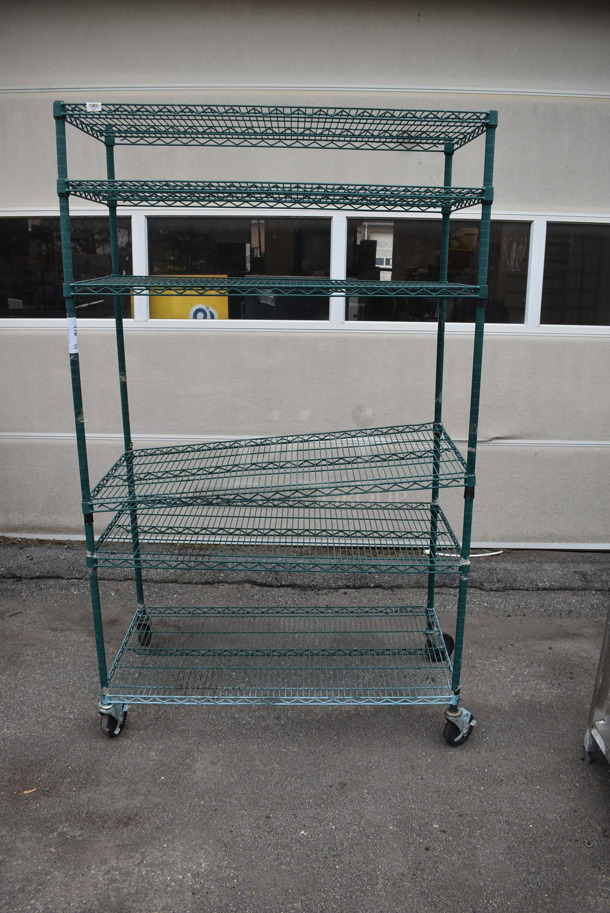 Wire Shelving Unit With 5 Polycoated Shelves In Green on Commercial Casters.  - Image 1 of 5