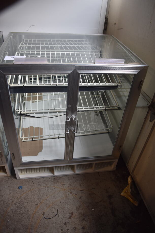 Dry Bakery Case With Double Glass Door and Polycoated Racks.