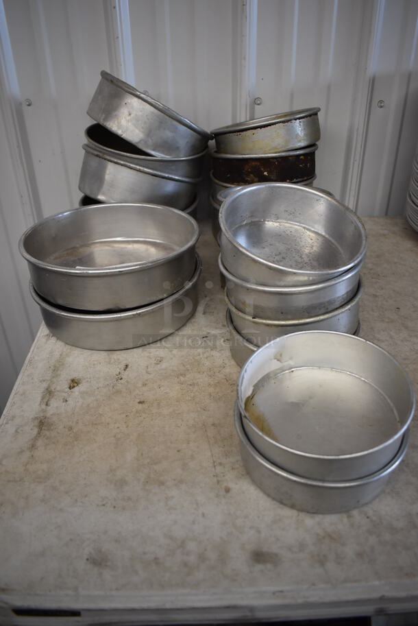 ALL ONE MONEY! Lot of 18 Various Metal Round Baking Pans. Includes 9.5x9.5x2.5, 8.5x8.5x3, 7.5x7.5x2, 6.5x6.5x3, 6.5x6.5x2