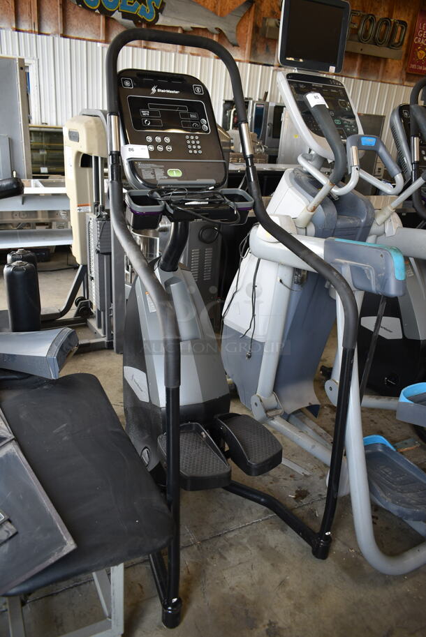 Stair Master Commercial Floor Style Stationary Exercise Stepping Machine w/ Monitor and Heart Rate Handle Grip Monitors and Cup Holders. Tested and Working! - Image 1 of 4
