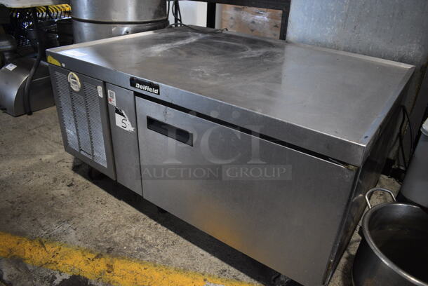 Delfield Stainless Steel Commercial Single Door Chef Base on Commercial Casters. 47x35x24. Tested and Powers On But Does Not Get Cold