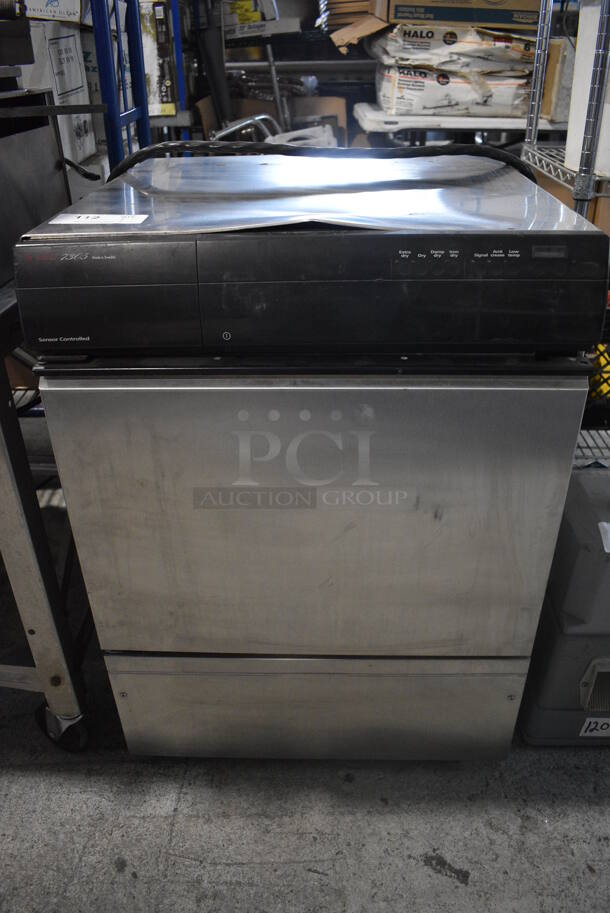 Asko Model TD 73A 7305 Stainless Steel Commercial Front Load Washer. 208-240 Volts. 24x24x32.5
