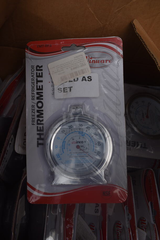 22 BRAND NEW! Sets of Winware Thermometers; One Cooler / Freezer Thermometer and One Oven Thermometer. Total of 44 Thermometers. 22 Times Your Bid!
