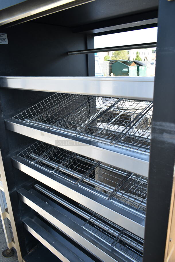 Vulcan 1013776 Metal Commercial Bakery Bagel Donut Merchandiser Rack on Commercial Casters.  - Image 2 of 6