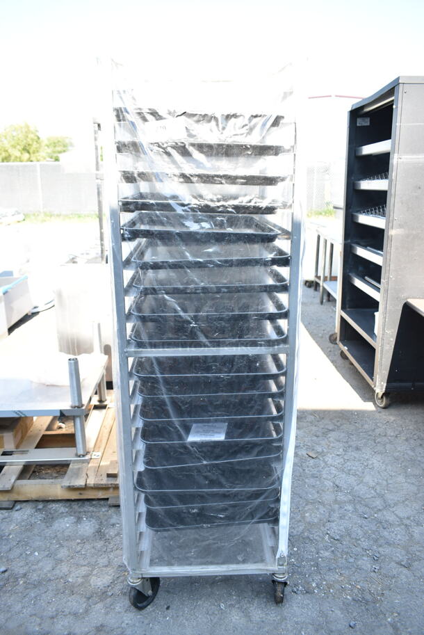 Metal Commercial Pan Transport Rack on Commercial Casters w/ Black Pans and Clear Cover.  - Image 1 of 6