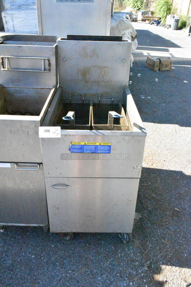 2018 Pitco Frialator 65C Stainless Steel Commercial Floor Style Natural Gas Powered 65 Pound Capacity Deep Fat Fryer w/ 2 Metal Fry Baskets on Commercial Casters. 150,000 BTU.  - Image 1 of 8