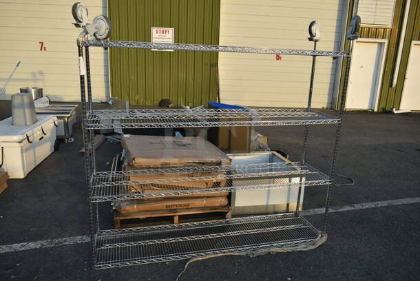 Chrome Finish 4 Tier Wire Shelving Unit on Commercial Casters. BUYER MUST DISMANTLE. PCI CANNOT DISMANTLE FOR SHIPPING. PLEASE CONSIDER FREIGHT CHARGES. - Image 1 of 3