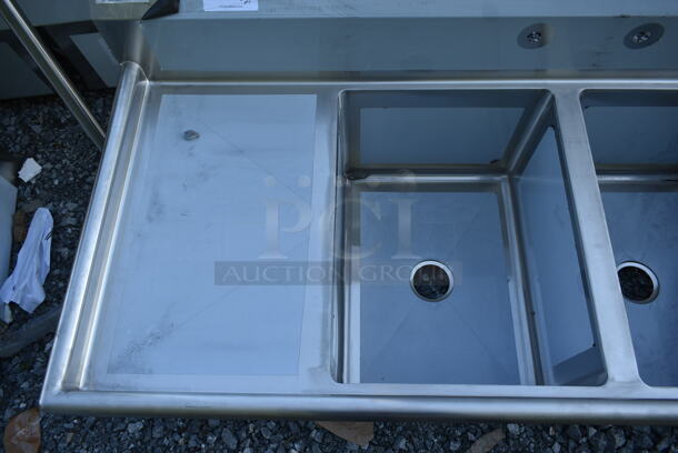 BRAND NEW SCRATCH AND DENT! Regency 600S21824218 Stainless Steel Commercial 2 Bay Sink w/ Dual Drain Boards. No Legs. Bays 18x24. Drain Boards 16.5x26  - Image 2 of 5