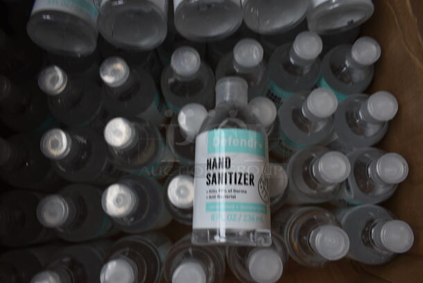 ALL ONE MONEY! Lot of 62 Defendr Hand Sanitizer Bottles! 2.5x2.5x5.5