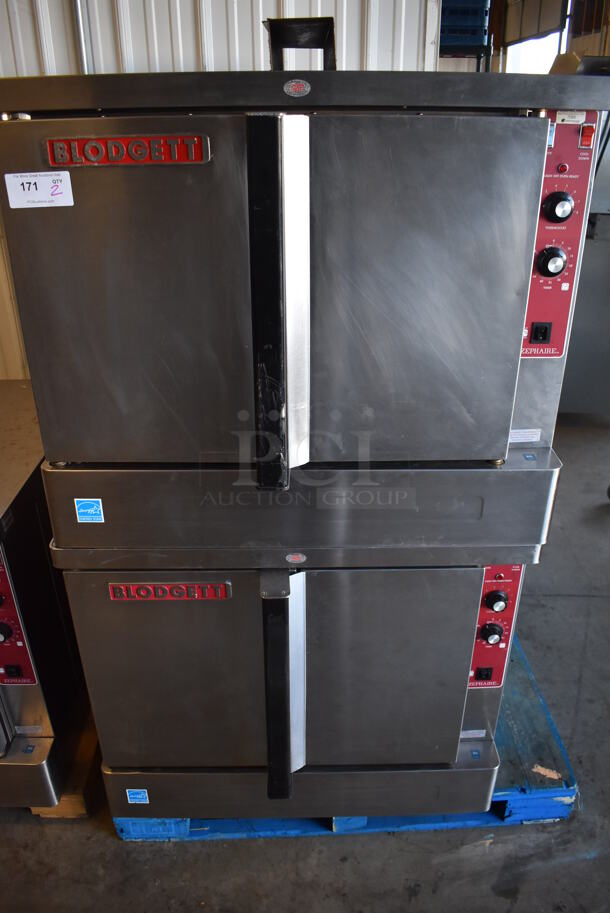 2 Blodgett Zephaire ENERGY STAR Stainless Steel Commercial Electric Powered Full Size Convection Ovens w/ Solid Doors and Thermostatic Controls. Comes w/ Legs. 208 Volts, 3 Phase. 39x37x64. 2 Times Your Bid!