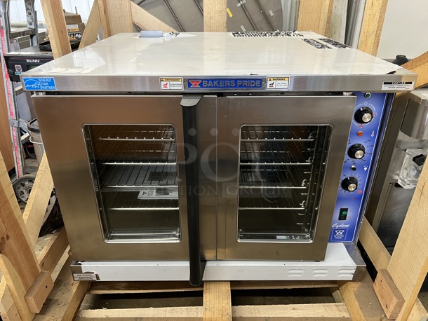BRAND NEW! Baker's Pride Model GDCO-E1 Stainless Steel Commercial Electric Powered Full Size Convection Oven w/ View Through Doors, Metal Oven Racks and Thermostatic Controls. Comes w/ BRAND NEW Legs. 240 Volts, 1 Phase. 38x43x27