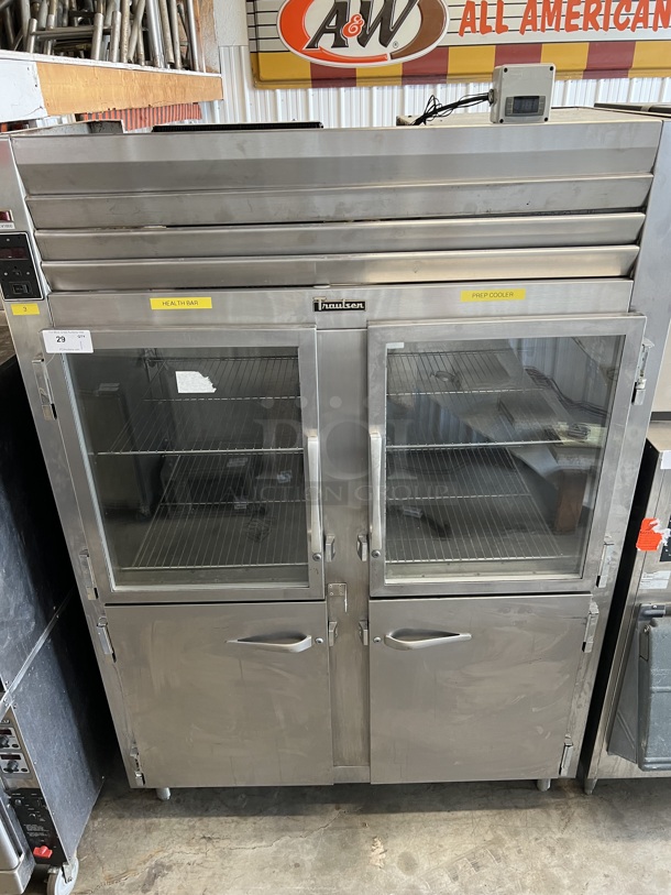 Traulsen Model RHT 2-32WUT Stainless Steel Commercial 4 Half Size Door Reach In Cooler w/ Metal Racks. 115 Volts, 1 Phase. 58x34x83. Cannot Test - Unit Was Previously Hardwired