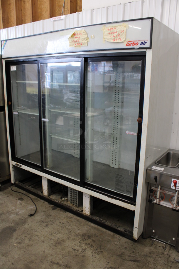 Turbo Air Model TGM-69R Metal Commercial 3 Door Reach In Cooler Merchandiser w/ Poly Coated Racks. 115 Volts, 1 Phase. 78.5x30x80. Tested and Powers On But Temps at 51 Degrees