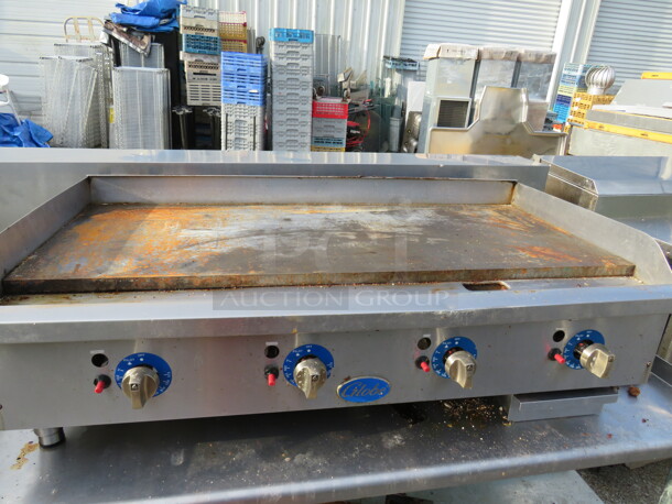 One WORKING 4 Foot Natural Gas Globe Griddle. 48X29X16 - Image 1 of 3