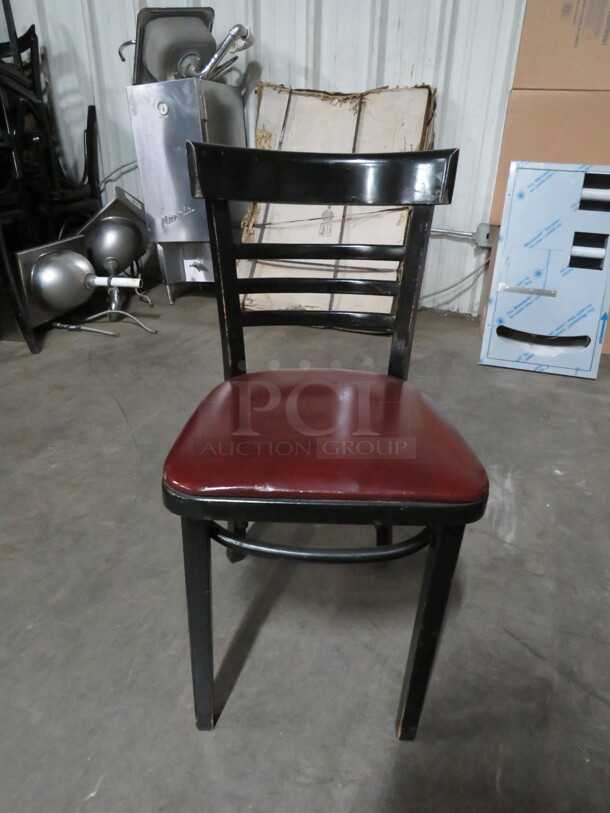 Black Wooden Chair With A Burgundy Cushioned Seat. 2XBID