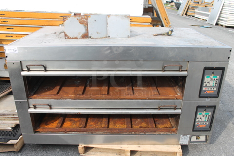 Doyon 3T2 Stainless Steel Commercial Electric Powered Double Deck Bakery Oven. Comes w/ Cooking Stones and 3 Legs. 208 Volts, 3 Phase.