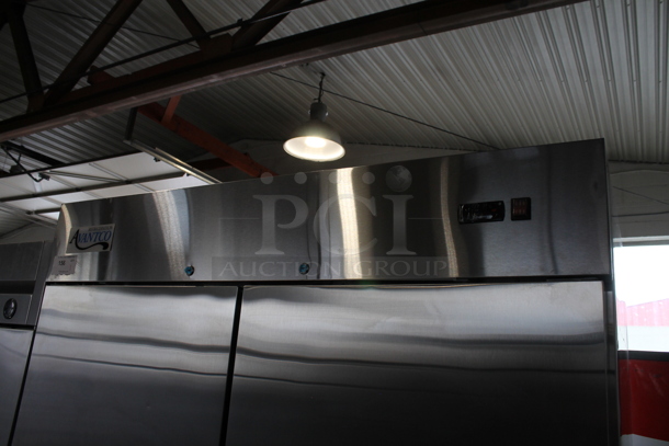 BRAND NEW SCRATCH AND DENT! 2022 Avantco 178A49RHC Stainless Steel Commercial 2 Door Reach In Cooler w/ Poly Coated Racks on Commercial Casters. 115 Volts, 1 Phase. Tested and Working! - Image 2 of 8