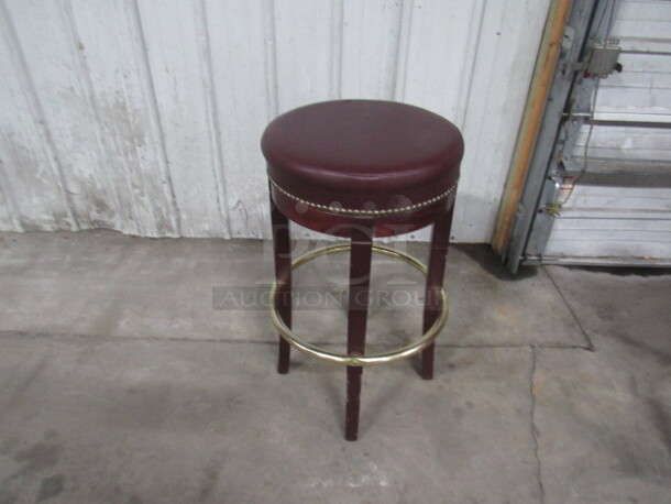 Wooden Barstool With Cushioned Seat, Nailhead Trim, And Footrest. 2XBID
