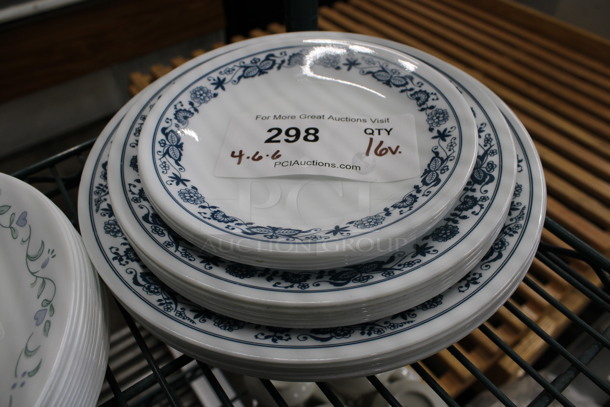 16 Various Sized White Ceramic Plates w/ Blue Patterned Rim. Includes 10.5x10.5x1. 16 Times Your Bid!