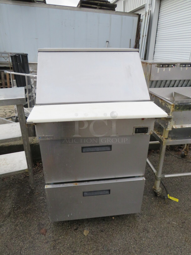 One WORKING Delfield 2 Drawer Refrigerated Prep Table With Cutting Board On Casters. Model# 18MC27P-BI. 115 Volt. 27X39X49