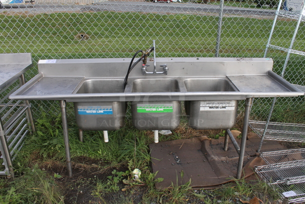 Stainless Steel Commercial 3 Bay Sink w/ Dual Drain Boards and Handles. Bays 16x20. Drain Boards 16x23 - Image 1 of 5