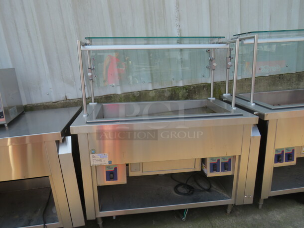 One Stainless Steel Mod U Serve Refrigerated Cold Well, With Sneeze Guards. 120 Volt. Model# MCT-CF3. 51X29X57 - Image 1 of 1