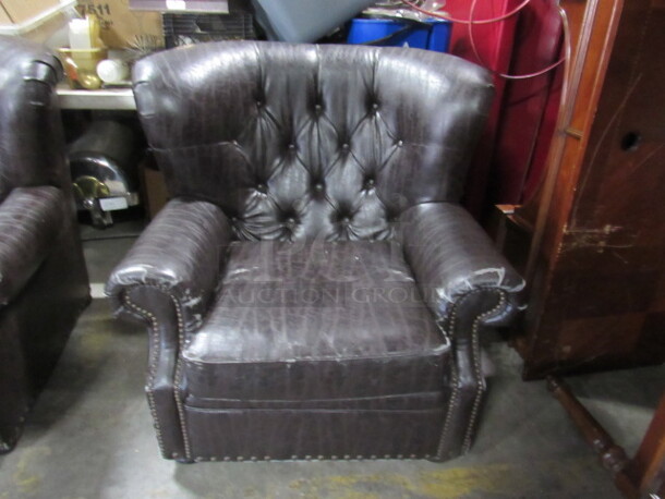 One AWESOME Brown Leather Look Over Stuff Chair. VERY COMFY