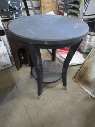 One Black Wooden Table With Under Shelf. 21X26