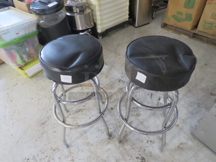Double Chrome Ring Bar Stool With A Black Cushioned Swivel Seat. Need To Be Recovered. 2XBID