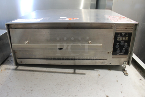 J&J Snack Foods 1502 Stainless Steel Commercial Countertop Electric Powered Snack Pizza Oven. 120 Volts, 1 Phase. Tested and Working!