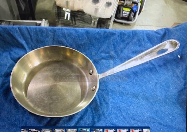 One Stainless Steel  7 Inch All Clad Saute Pan. 