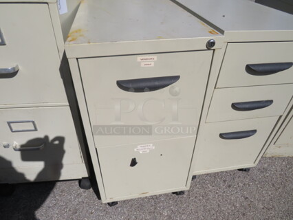 One 2 Drawer Metal File Cabinet On Casters. Missing 1 Handle. 15X23X27.5