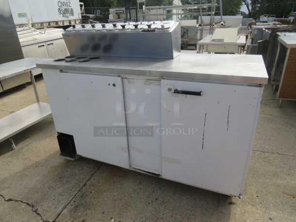 One Beverage Air 2 Door Refrigerator With 2 Racks, And A Cold Rail On Top With 9 Topping Containers And Lids And 6 Round Cylinders, On Casters. Working NOT Cold.  Model# MS68. 115 Volt. 69X28X50.5 - Image 1 of 5